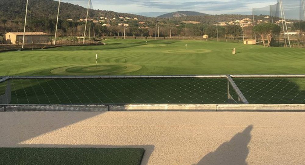 Atlanta Synthetic turf beside natural grass golf course