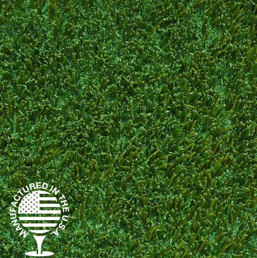 A close up image of artificial green grass.